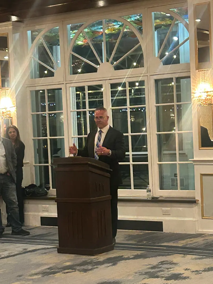 Sean Noonan speaking at a community event